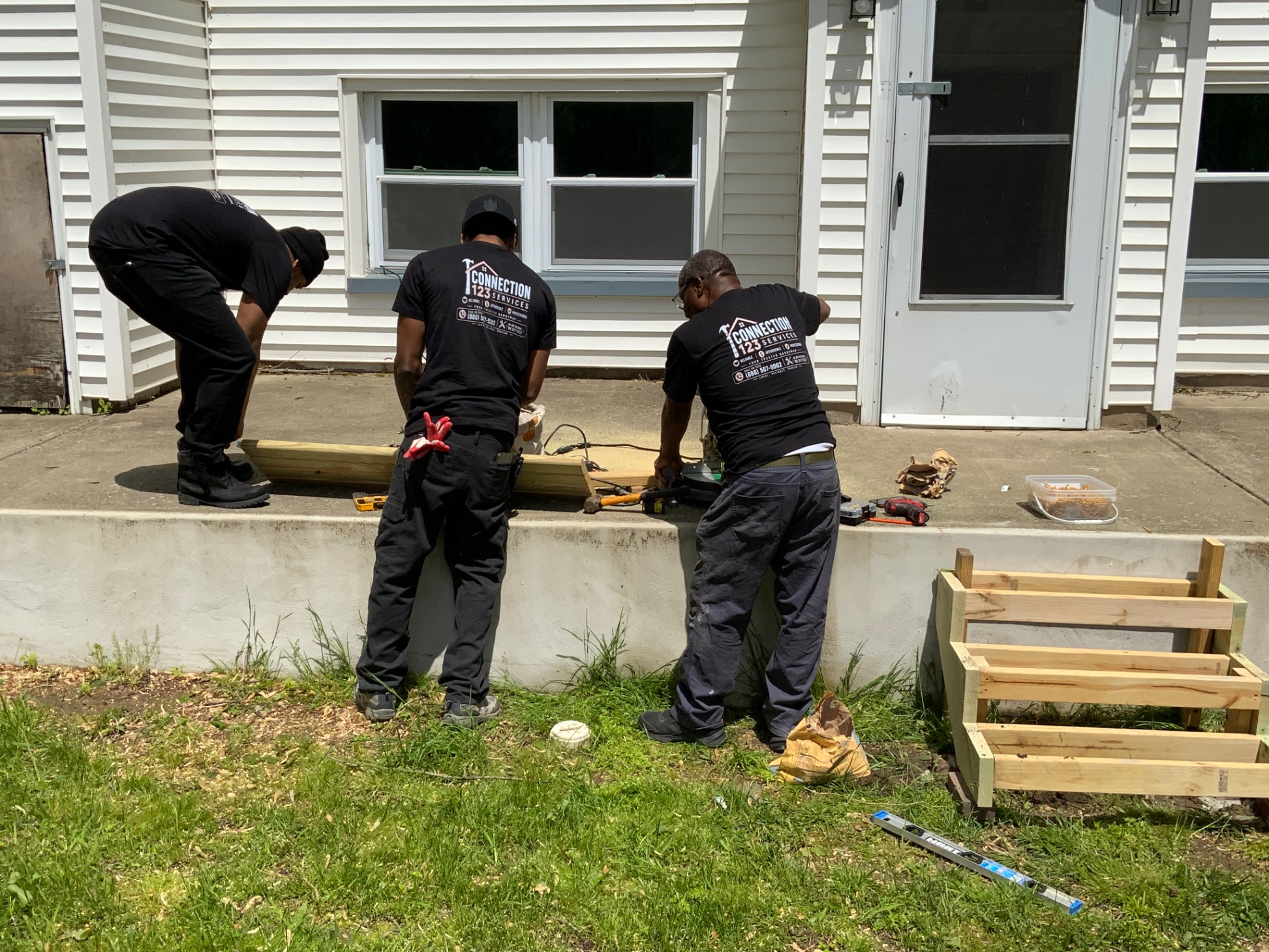 Connection 123 Services crew working on a carpentry project